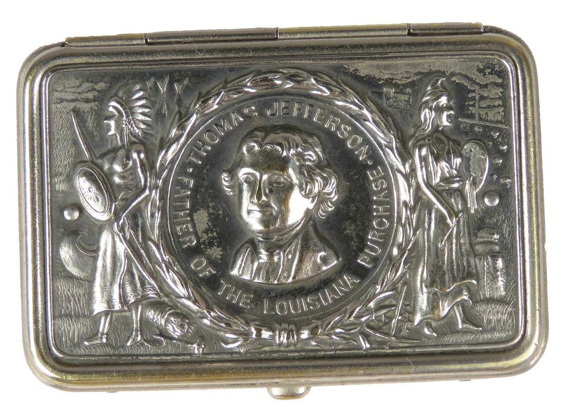Antique Americana Motif Match Safe: Antique Americana Motif Match Safe. Depicting Thomas Jefferson, Father of Louisiana and Native American Figures on each side of cameo. Nickel plated brass. 2 3/8 X 1 5/8 inches.