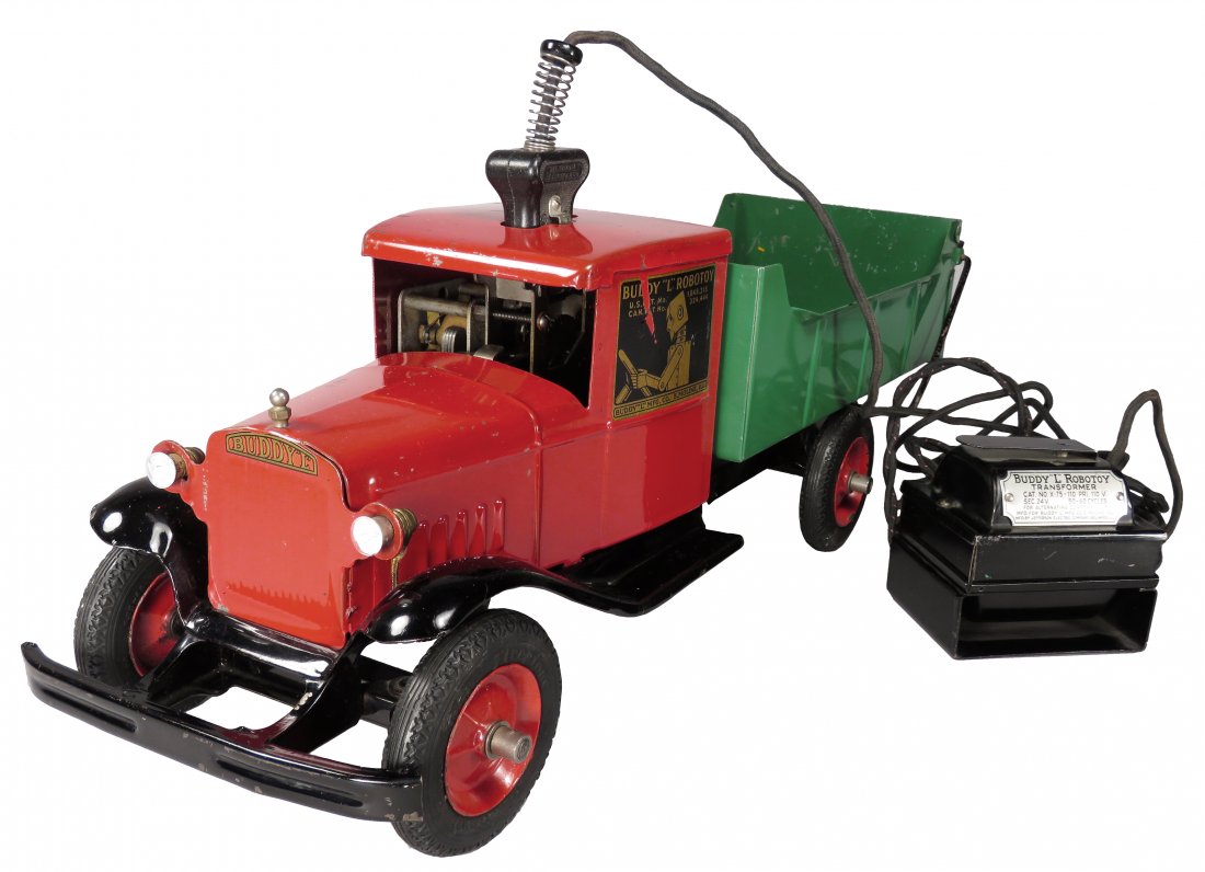 Buddy L Pressed Steel Robotoy Truck: Buddy L Pressed Steel, Robotoy Truck with headlights, motor and electric cord, ca. 1932. Original condition. Light paint chips otherwise very good condition. 21 1/2 inches long.