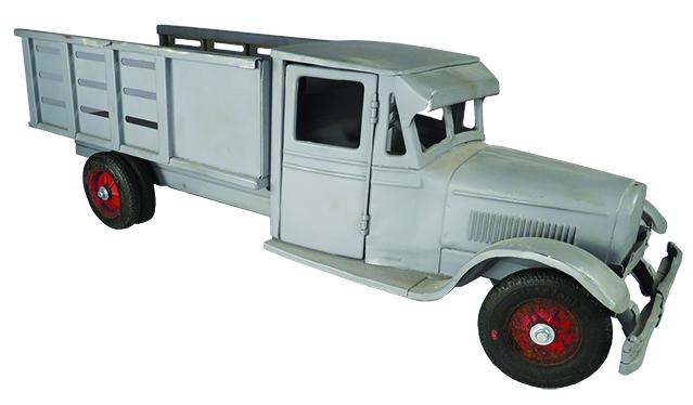 Buddy L Pressed Steel Toy Stake Body Truck: Buddy L Pressed Steel, Toy Stake Body Truck, ca. 1925-26. Model 203. Repainted (grey) condition, front left tire need cap to hold wheel on axle. 23 1/2 inches long.