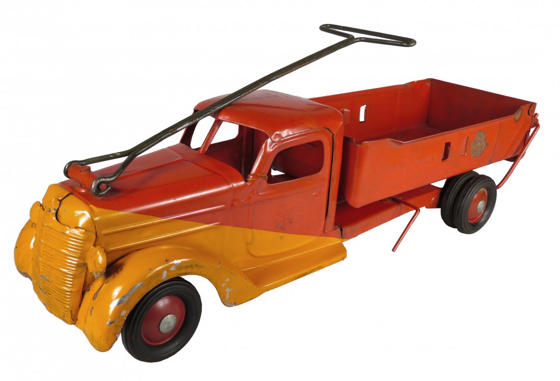 Buddy L Pressed Steel Toy Rider Dump Truck: Buddy L Pressed Steel, Toy Rider Dump Truck, ca. 1945-46. Model 702, red and orange. Purchased at Buddy L morgue sale. Repainted condition. Missing seat, paint scratches. 21 inches long.