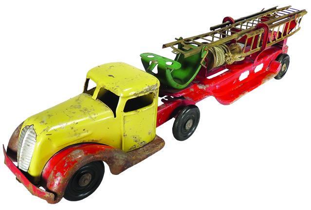 Turner Pressed Steel Toy Ford Fire Tractor and Truck: Turner Pressed Steel, Toy 1938 Ford Fire Tractor and Hose Truck, ca. 1939. Original condition painted cream, red and green. Significant paint wear on fenders and running boards. 31 inches long overall