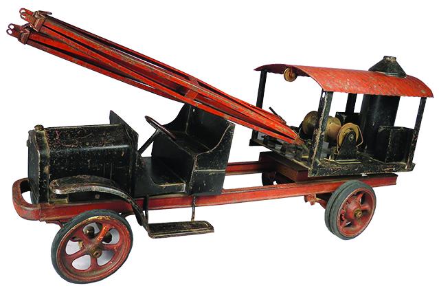 Kelment Pressed Steel Toy Universal Crane Truck: Scarce Kelment Pressed Steel, (Big Boy)Toy White Universal Crane Truck. Model 507, ca. 1926. Original good condition with scratches and paint loss. 25 inches long.