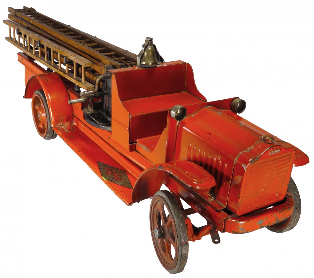 Kelment Pressed Steel Toy Aerial Ladder Fire Truck: Kelment Pressed Steel, Toy (Big Boy) Aerial Ladder "White "Fire Truck, ca. 1926. Original condition with wood ladders. Scratches mostly on edges. 36 inches long overall including ladders.
