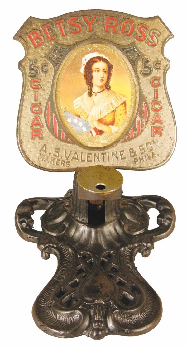Betsy Ross Cigar Tip Cutter. A.S. Valentine & Son: Betsy Ross Cigar Tip Cutter. A.S. Valentine & Son, Philadelphia. Cast iron, good original condition. 6 X 7 1/2 X 8 1/2 inches.