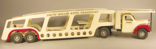 Smith Miller, Toy Truck, Auto Transport: Smith-Miller Toy Truck, Auto Transport Complete with a ramp, Ivory Mack Truck. Fred Thompson production "CO44". 39 inches long.