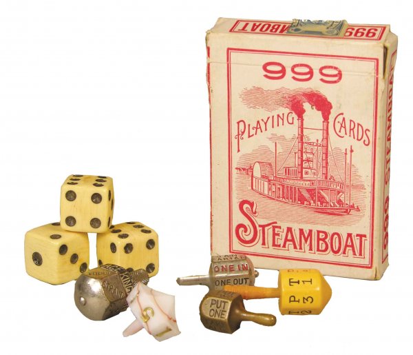 Gambling items including Steamboat Playing cards: Asst. of Gambling items including Deck of Steamboat Playing cards, five put-in-take spinners and three bone dice.
