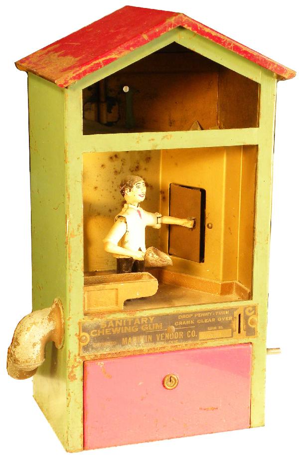 Baker Boy Gum Machine: Baker Boy Gum Machine. Manikin Vendor Co. Portland, OR. No glass, rust otherwise very good original working condition, no key. 10 X 16 X 6 inches.
