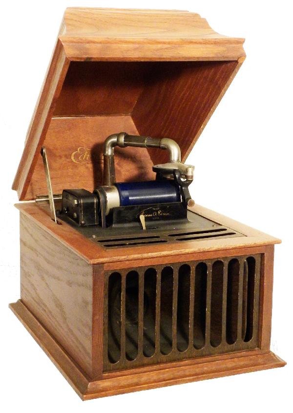 Edison Amberola DX Phonograph: Edison Amberola DX Phonograph, Serial # 15744. Last patent date May 31, 1906.Table top model with inside horn and original oak case. Top lid is slightly warped otherwise very good all original conditi