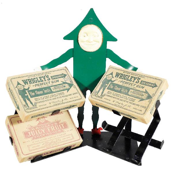 Wrigley's Gum Display Fixture: Wrigley's Gum Display Fixture. Holds four gum boxes, comes with three. Original celluloid face and repainted fixture. Excellent condition. 14 1/2 X 13 3/4 X 6 1/4 inches.