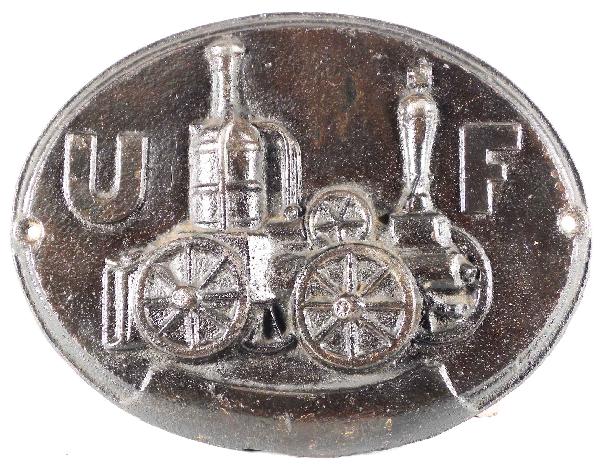 Cast Iron Fire Mark: Cast Iron Fire Mark, "UF" depicting fire pumper. Issue of 1862. United Firemen's Insurance Company of Philadelphia. Oval shaped with beveled edge. Good original condition. 12 X 9