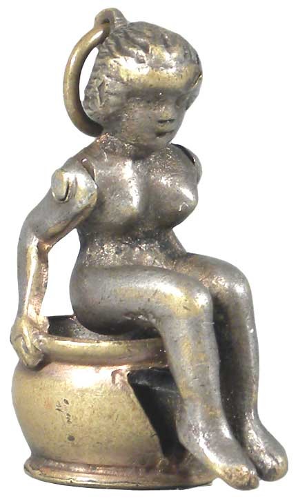 Figural Cigar Tip Cutter: Figural Cigar Tip Cutter, depicting Girl on "Thunder Mug". Excellent condition. One inch tall.