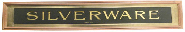 Silverware Reverse Glass Sign: "Silverware" Reverse Glass Sign. High quality with gold leaf, brass perimeter and cherry wood frame. Good condition. 62 3/4 X 9 7/8 inches.