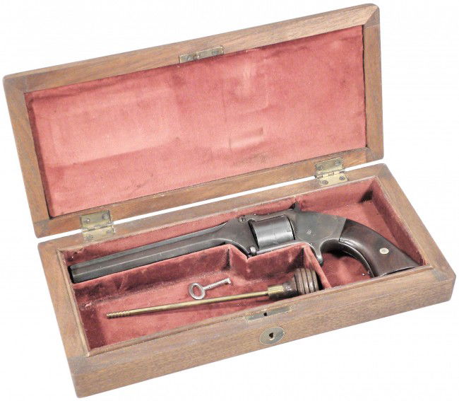 Smith & Wesson Model #2 Army cased pistol: Smith & Wesson Model #2 Army cased pistol. .32 cal, Rimfire long single action 6 shot. Manufactured between 1861 and 1874, latest patent day Dec. 25, 1863 stamped on barrel. Carried mostly by officers
