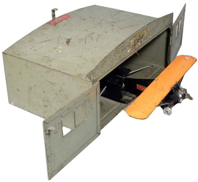 Buddy L Pressed Steel Toy Catapult Airplane & Han: Buddy L Pressed Steel Toy Catapult Airplane and Hangar. Model No. 2007, 1930-31. Monocoupe airplane. Most of original paint intact, some scratches and normal wear otherwise very good condition. Hangar