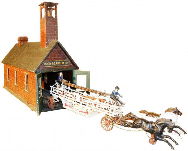 Fireman's Ladder Wagon Toy & Custom Fire House: Cast Iron Fireman's Horse drawn Ladder Wagon Toy. Dent Hardware Mfg. Comes with two men. Some paint loss otherwise very good condition. 30 inches long. And a Custom made Fire House. Made by a carpente