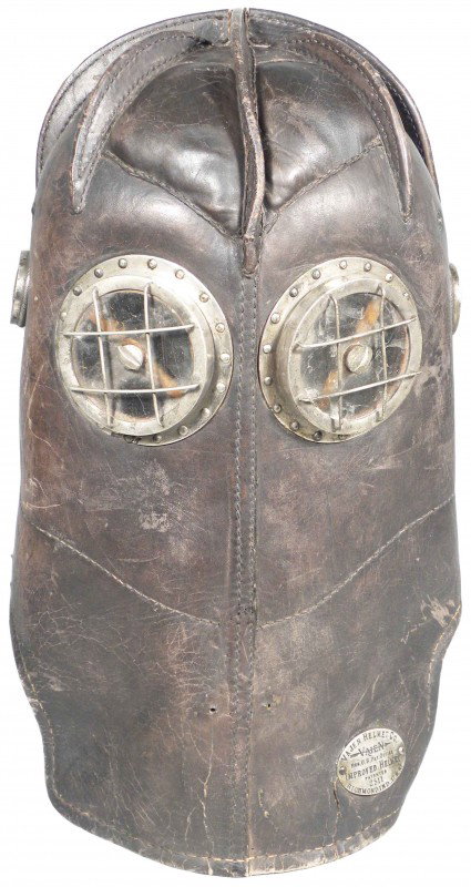 Firemen's Leather Helmet, Vajen Head Protector: Firemen's Leather Helmet. The Vajen Head Protector. The handy helmet helps the man behind the hose by enabling him to locate the fire, no matter how dense the smoke, and to walk through flame unharmed
