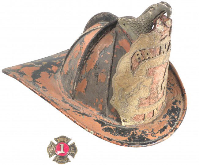 Leather Fire Helmet, Rainbow #1: Leather Fire Helmet, Reading, PA. Rainbow "1" L.N. front shield with high eagle holder. 1773 stenciled on back brim. Made by Dentzeau Bros. Comes with enamel and brass fire badge, "1" Rainbow Fire Co.