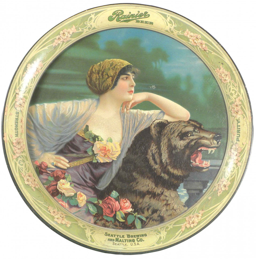 Ranier Beer Tin Serving Tray: Ranier Beer Tin Serving Tray. Seattle Brewing and Malting Co. Seattle, USA. Normal crazing and 1/4 scratch in center otherwise excellent condition. 13 inch diameter.