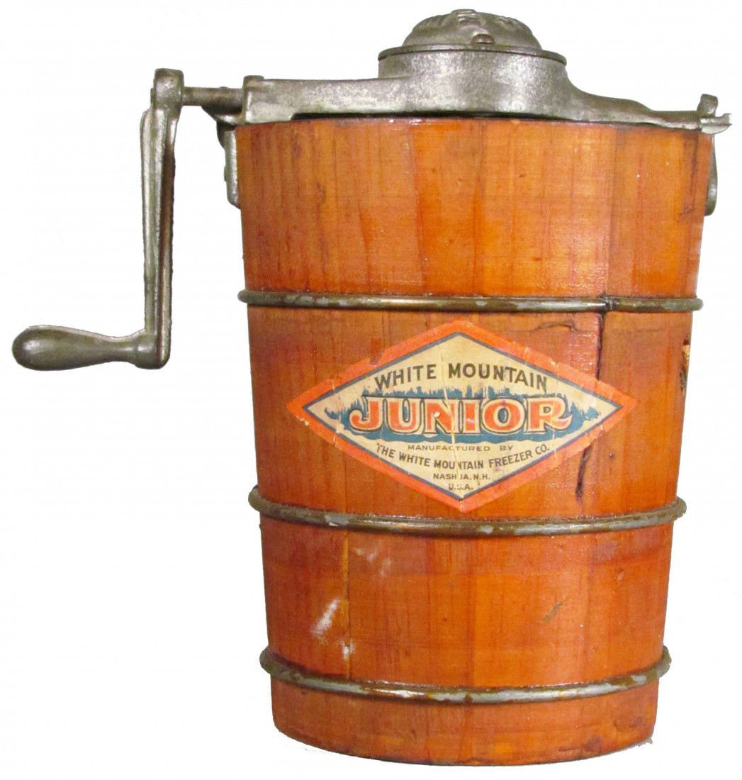 White Mountain "Junior" Ice Cream Freezer: White Mountain "Junior" Ice Cream Freezer. The White Mountain Freezer Co. Nashua, NH. Original paper label on front. Excellent condition. 5 inch diameter X 8 inches tall.