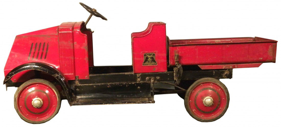 Steelcraft "Bulldog" International Pedal Car (Truc: Steelcraft "Bulldog" International Motor Co. Pedal Car. Mack Dump Truck. The real ones came in 3 models 1-2-5 ton trucks. Excellent original condition. 65 inches long.