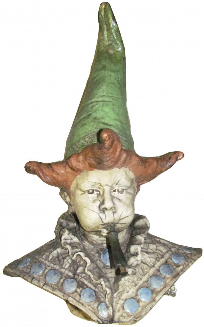 Cigar Store Outdoor Stone Bust, "Jester": Cigar Store Outdoor Stone Bust, "Jester". Original enamel paint, hung from chains on the outside wall of a Cigar Store. Damage to cigar tip and tip of hat otherwise good condition. 38 X 22 X 13 inches