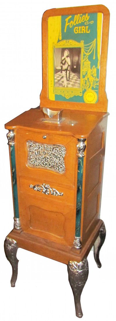 Follies Girl Cail-O-Scope: Follies Girl Cail-o-Scope. Drop card 25 cent coin operated arcade game. Comes with a key. 71 inches tall.