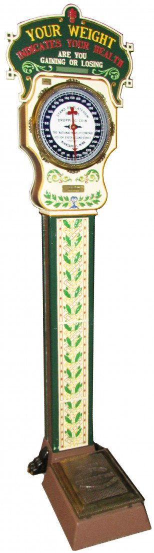 National Novelty Penny Scale: National Novelty penny Scale. The Novelty Scale Co. Minneapolis, Minn. Ca. 1915. Location brass tag Richardson's Machine Co. Aurora, Ill. . Porcelain face with lions feet. Excellent restored working c