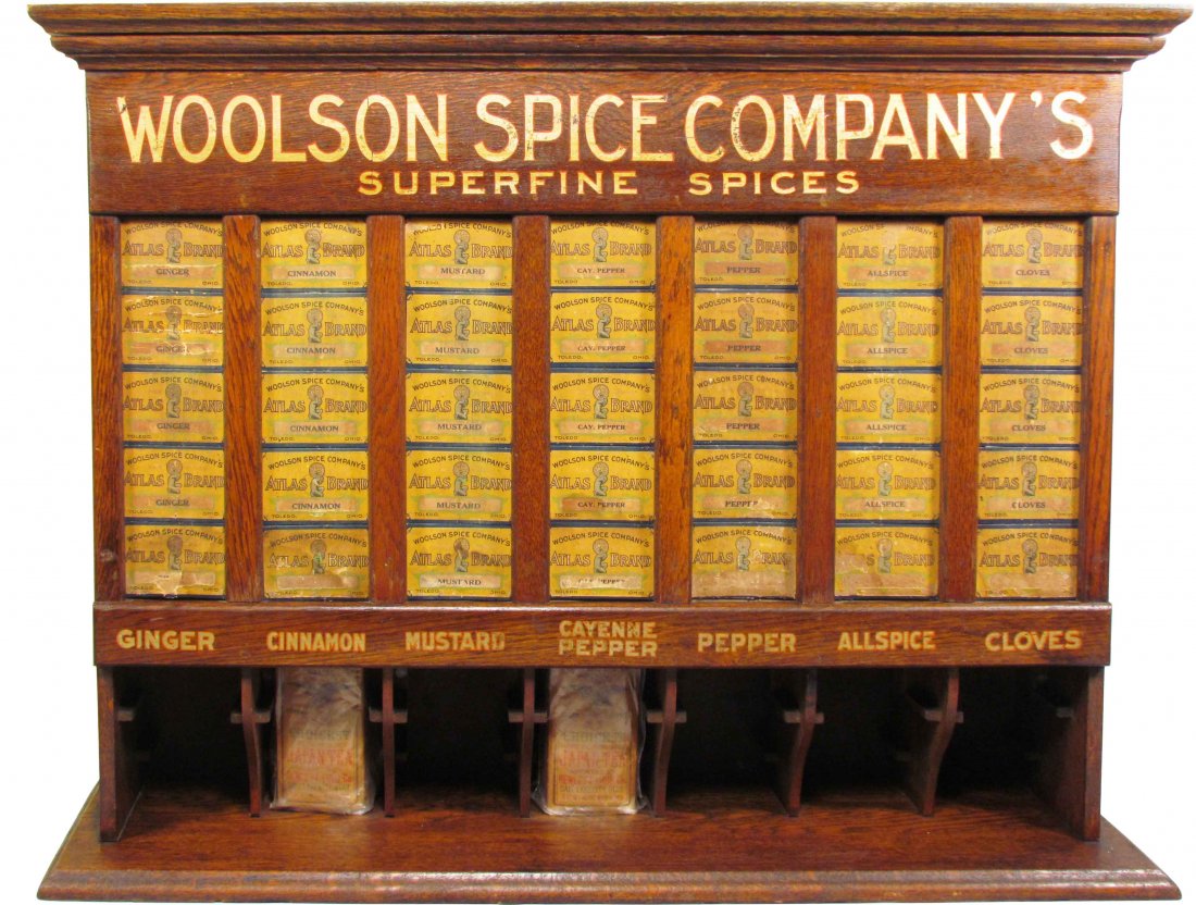 Woolson Spice Company's Oak Cabinet: Woolson Spice Company's Oak Store Display Cabinet. Woolson's Atlas Brand Spice Fronts and original decals. Very good original condition. 33 1/2 X 25 1/2 X 9 inches.