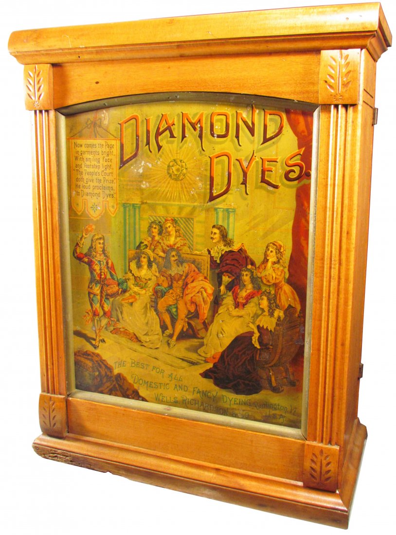 Diamond Dyes Store Cabinet: Diamond Dyes Store Cabinet. Court Jester motif. Original paper label with Grand Rapids and Indiana Railway. Interior complete. Some age discoloration, minor paint loss and damage to base otherwise ver