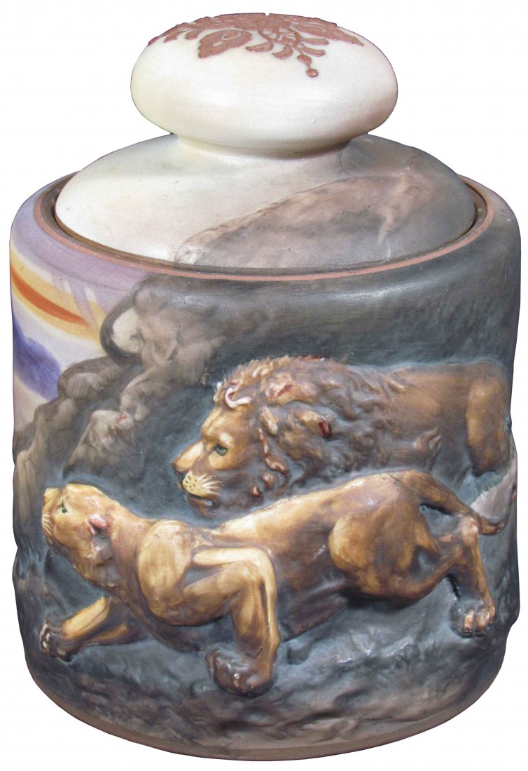 Nippon High Relief Porcelain Humidor: Hand Painted Nippon High Relief Porcelain Humidor. Depicting lions. No chips or cracks. 7 inches tall X 5 inch diameter.