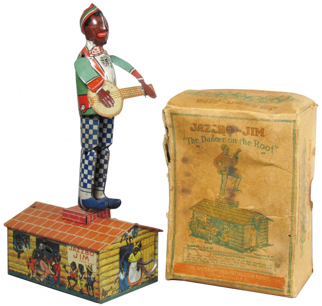 Jazzobo Jim Tin Wind Up Toy in Original Box: Jazzobo Jim Tin Wind Up Toy in Original Box. "The Dancer on the Roof". Toy has very minor scratches, excellent working condition, box shows staining and wear. 10 inches tall.