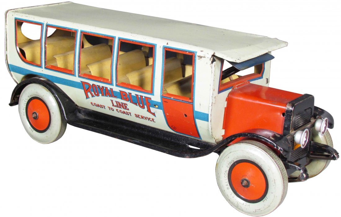 J. Chein Royal Blue Line Tin Toy Bus: Royal Blue Line Tin Toy Bus. Red, Grey and Blue. Hercules Balloon Cord Tires. Normal playwear otherwise very good condition. 18 1/2 inches long.