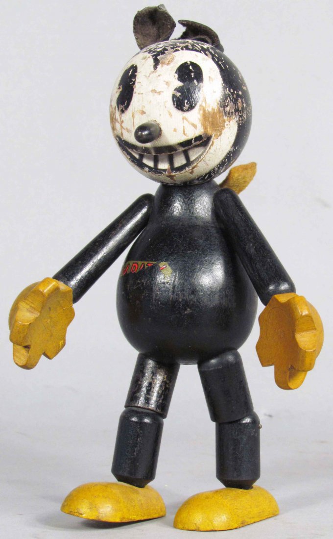 J. Chein & Co. Krazy Kat Wood Jointed Doll: J. Chein & Co. Krazy Kat Wood Jointed Doll. Copyright 1932. Felt bow and leather ears intact. Some paint loss and just one nub for a tail otherwise good condition. 7 inches tall.
