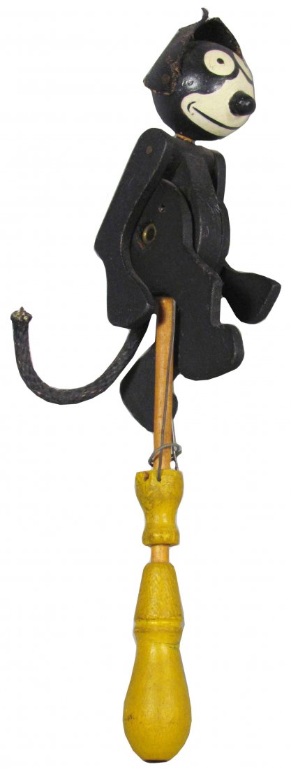 Felix the Cat Die Cut Wood Hand Puppet: Felix the Cat Die Cut Wood Hand Puppet. Copyright 1922/1924. Original tag, very good condition. 10 1/2 inches tall.