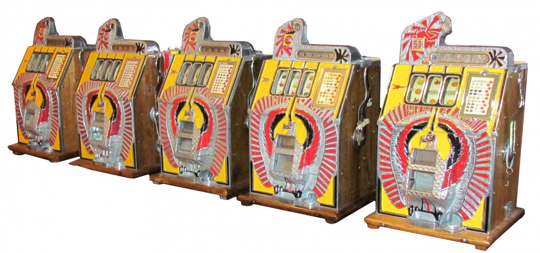 Set of Five Mills War Eagle Slot Machines: Set of Five Mills War Eagle Slot Machines. Rare 1937 1 Cent, Serial # 397037, first year producted without the reserve jackpot showing. 1936 5 Cent, Serial # 387322, with original mint vendor to get a