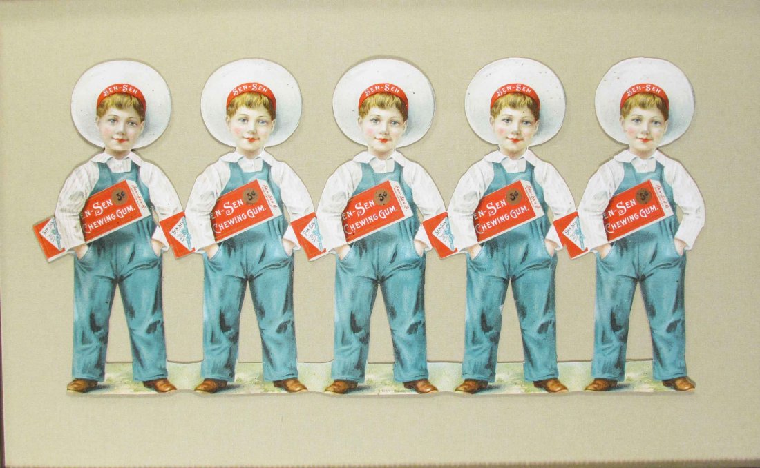 Sen-Sen Gum Die Cut Cardboard Sign: Sen-Sen Gum Die Cut Uncut boys, horizontal version. Stecher Lith Co. Rochester, NY. Framed under glass. Very slight specs on caps otherwise near mint condition. 19 X 9 1/2 inches image only.