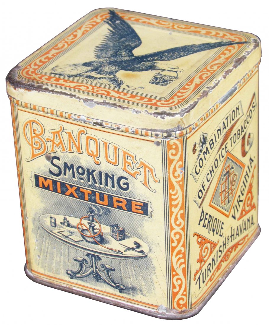 Banquet Smoking Mixture Tobacco Tin: Banquet Smoking Mixture Tobacco Tin. American Eagle Tobacco Co. Detroit, Mich. S. A. Ilsley & Co. New York Tin Co. Graphics depicting smoking paraphernalia. Hinged lid. Scratches and minor paint loss 