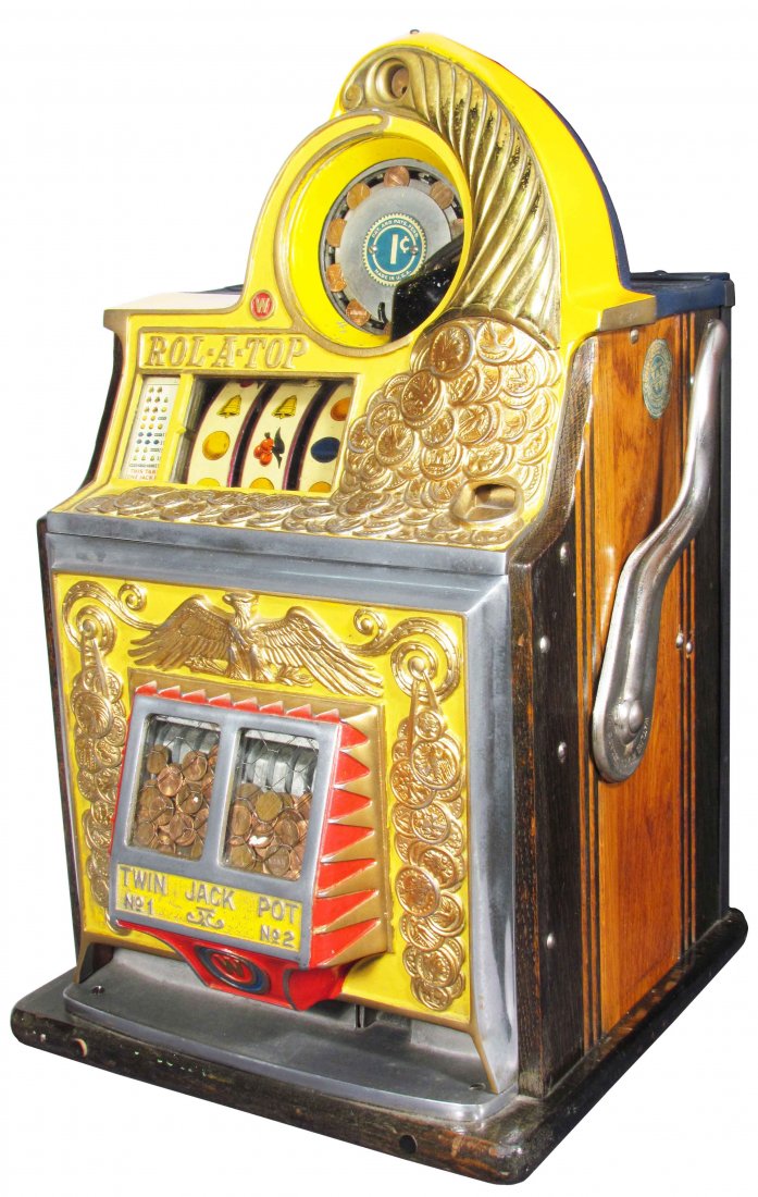 Watling One Cent Rol-A-Top Slot Machine: Watling One Cent Rol-A-Top Eagle Front Slot Machine. Very good unrestored working condition. Comes with keys.
