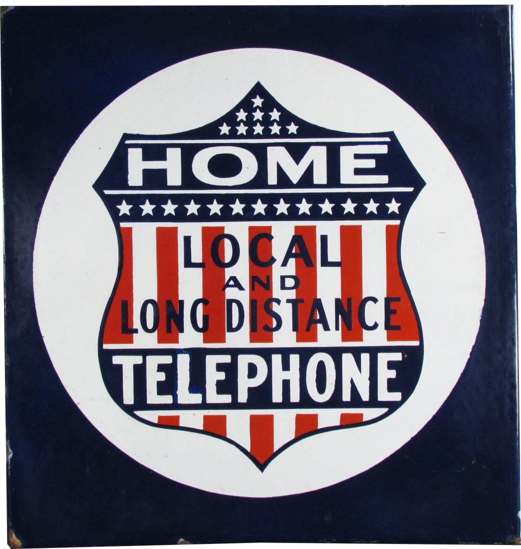 Home Telephone Porcelain Flange Sign: Home Telephone Local and Long Distance Porcelain Flange Sign, two sides. Edge chips and two small chips in shield on one side otherwise very good condition. 17 X 18 inches.