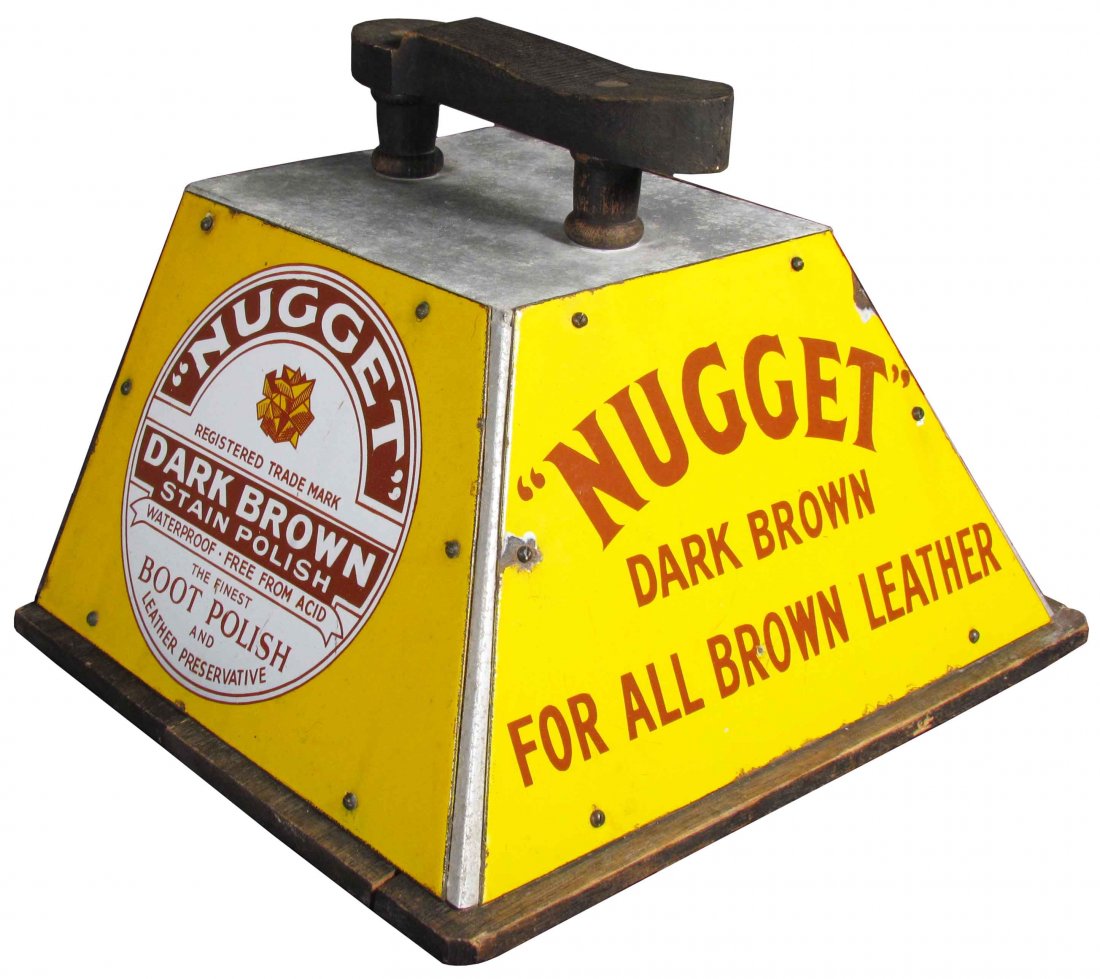 Nugget Boot Polish Shoe Shine Stand: Nugget Boot Polish Shoe Shine Stand. Porcelain, tin, and wood. A couple of chips around edges otherwise very good condition. 13 1/2 X 12 X 16 1/2 inches.