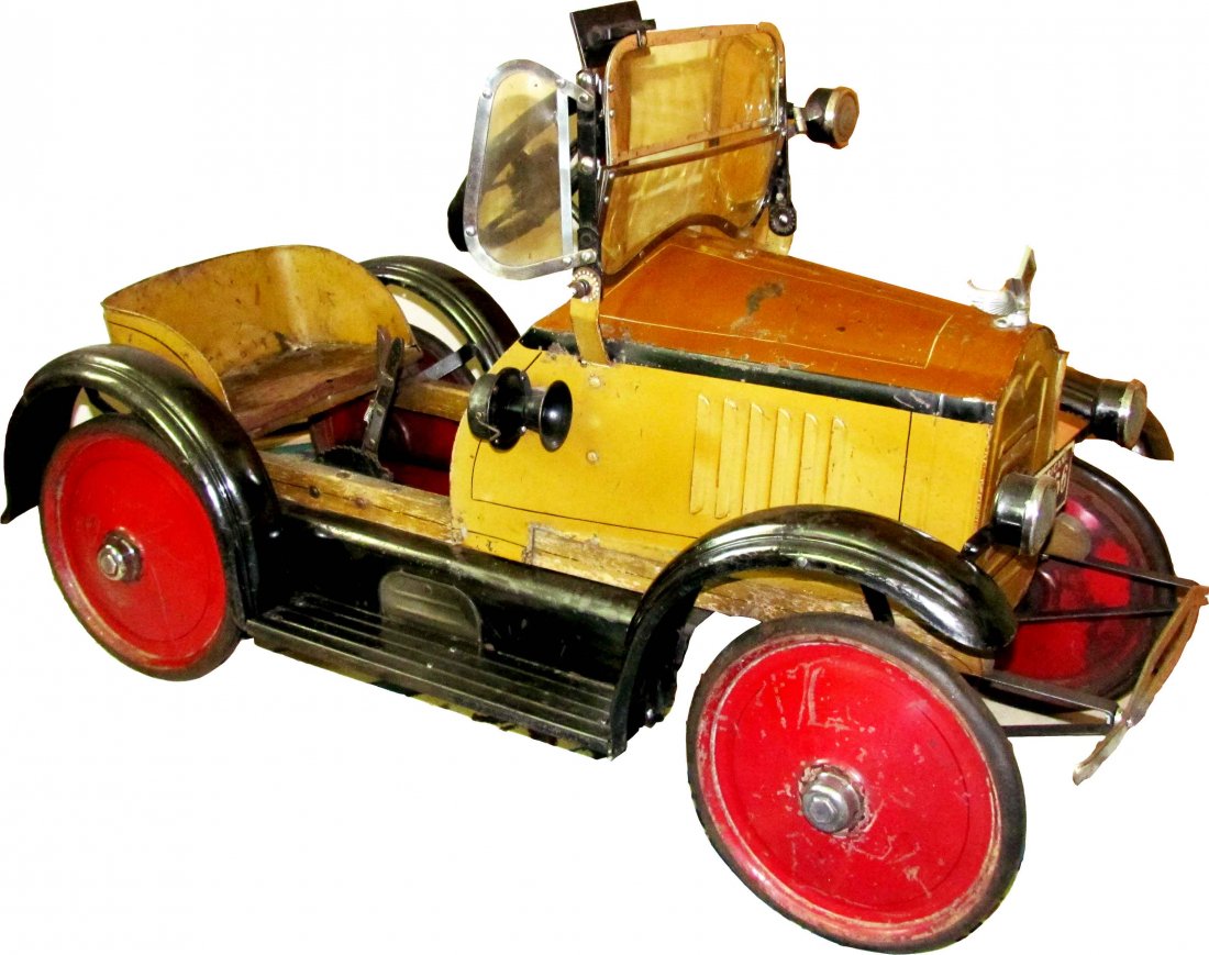 1925 American National Packard Pedal Car: 1925 American National Packard Pedal Car. Split windshield w/wings, black fenders, rear view mirror, spotlight, license plate with reverse "Stop" lettering and tilt steering wheel. Kaufman Collection.