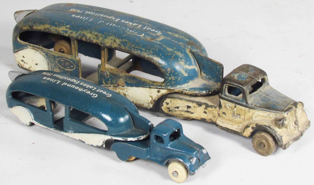 Two Promotional Cast Iron Toy Buses: Two Promotional Cast Iron Toy Buses. 1936 Great Lakes Exposition- Greyhound Lines. Arcade Toy Co. Very good to good condition. Longest measures 11 inches.