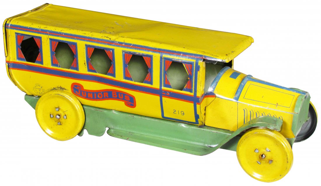 J. Chein No. 219 "Junior Bus" Tin Litho Toy: J. Chein No. 219 "Junior Bus" Tin Litho Toy. Some dents in the roof and light scratches otherwise good condition. 9 inches long.