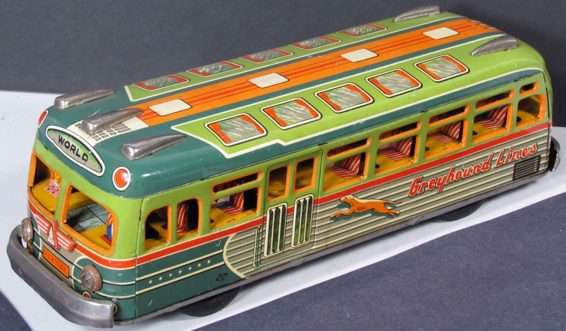 Marusan Toys Greyhound Tin Litho Toy Bus: Marusan Toys Greyhound Tin Litho Toy Bus, friction propelled. Very light scratches otherwise excellent condition. 12 1/2 inches long.