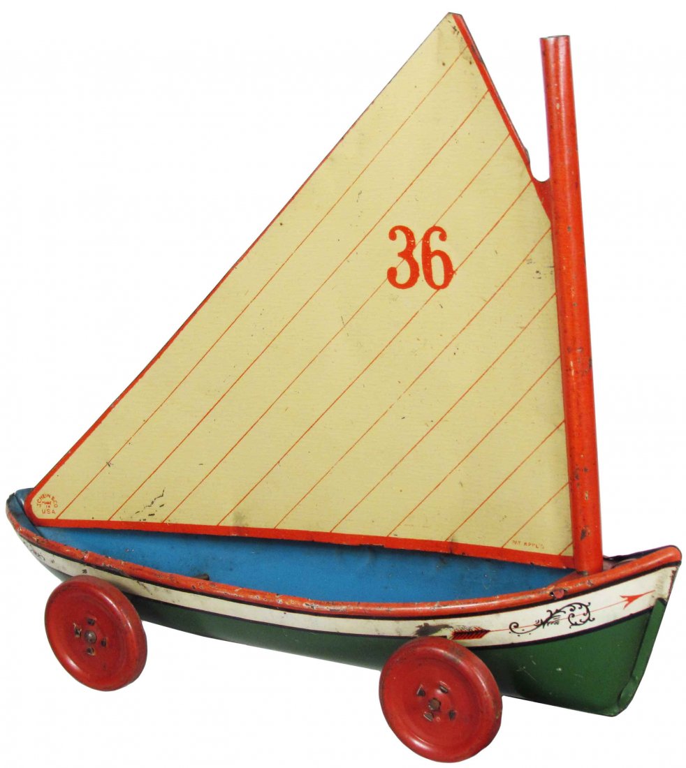J. Chein No. 36 "Emma" Tin Litho Toy Boat: J. Chein No. 36 "Emma" Tin Litho Toy Sail Boat pull toy. An early J. Chein vessel ca. 1910. Some paint loss, dents and scratches otherwise good condition. 9 inches tall.