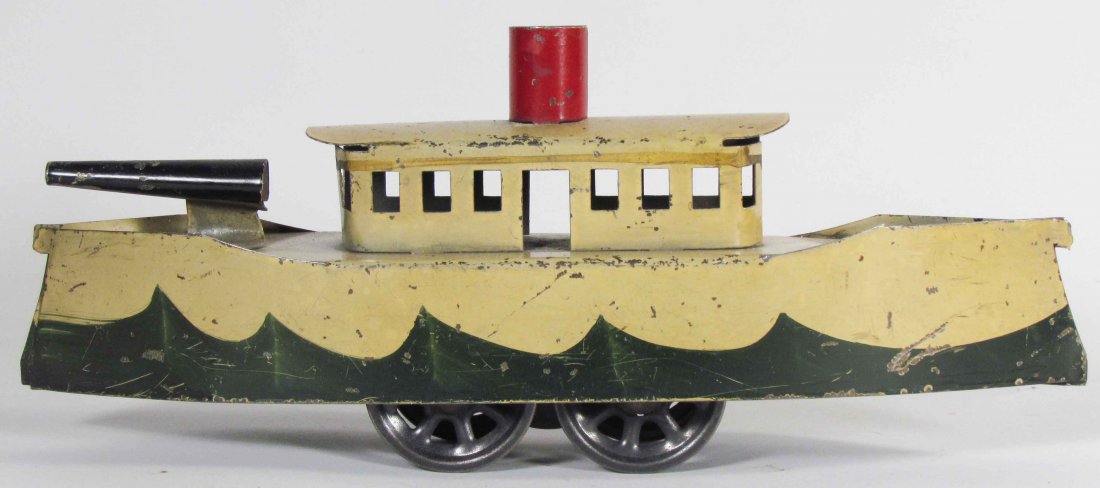 Gunboat Tin Litho Toy: Gunboat Tin Litho Toy. Friction propelled. One gun missing from deck. Scratches and paint loss. 10 inches long.