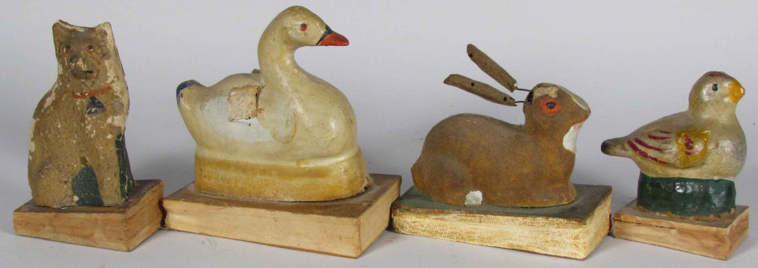 Animal Accordion Squeaker Toys: Very Early Paper Mache Animal Accordion Squeaker Toys. Swan, bunny, cat, and chicken. Only swan and bunny squeaking. Various sizes and condition. Largest measures 4 3/4 inches tall.