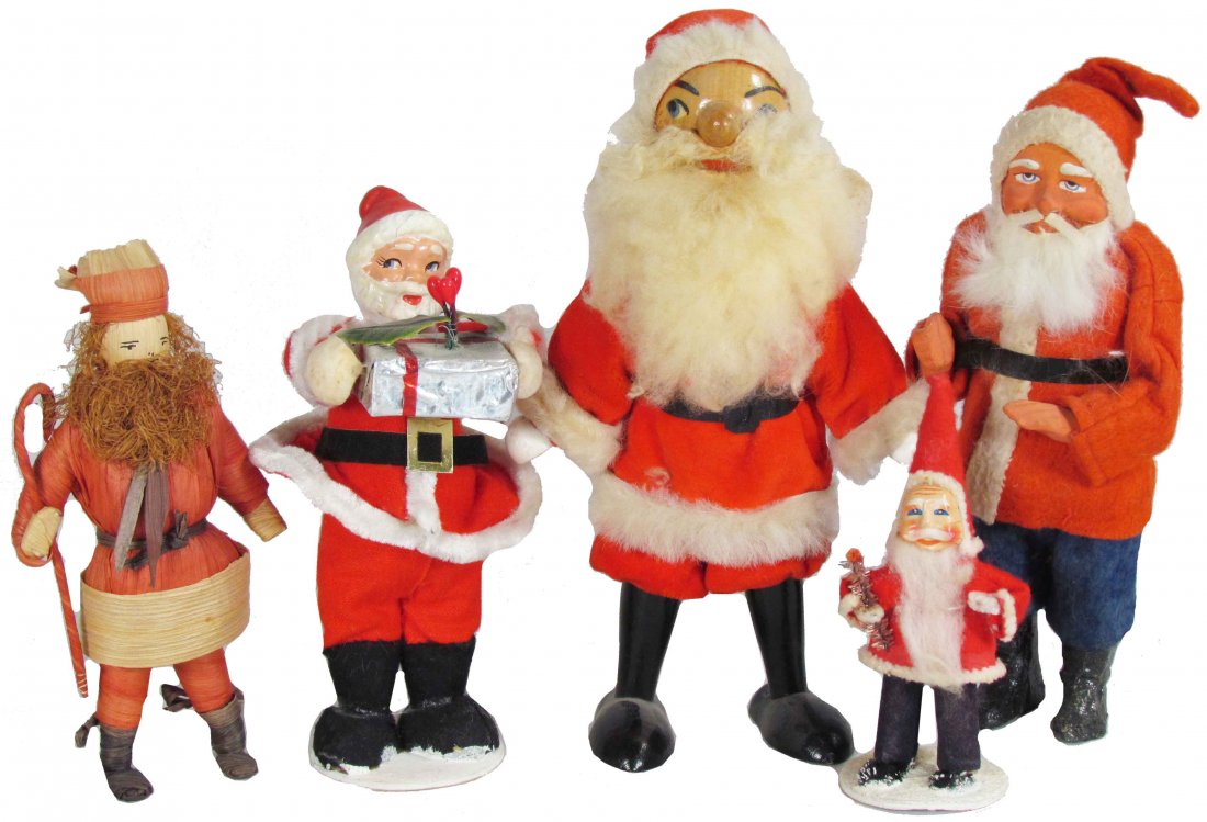 Five Early Santa Figures: Five Early Santa Figures. Polish all wood Santa, ca. 1950. Corn Husk Santa. Small Santa with celluloid face. "Japan" Santa with package and paper mache Santa with felt suit. Various conditions and siz
