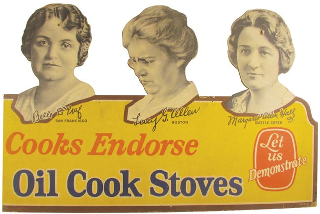 Oil Cook Stoves Die Cut Cardboard Store Display: Oil Cook Stoves Die Cut Cardboard Easel Back Window Store Display. Famous chefs from across the country depicted on sign. Margaret Hall has hole in forehead and dog eared corners otherwise good condit