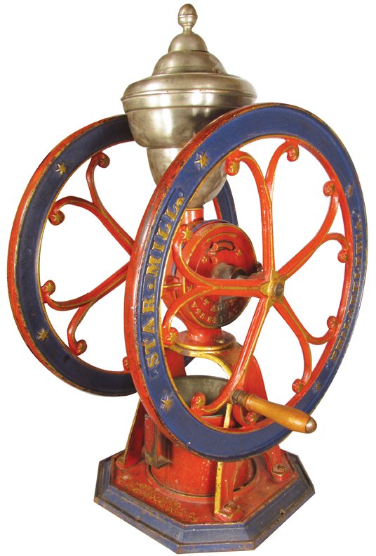 Star Mill Coffee Grinder: Star Mill Coffee Grinder. Henry Tromner Maker, Philadelphia, PA. Original paint and stenciling. Nickel plated tin hopper. Very good original condition. 35 inches tall X 22 inch wheel diameter.